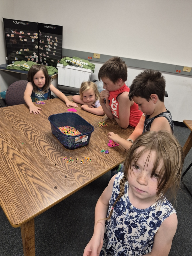 Making fruit magnets.