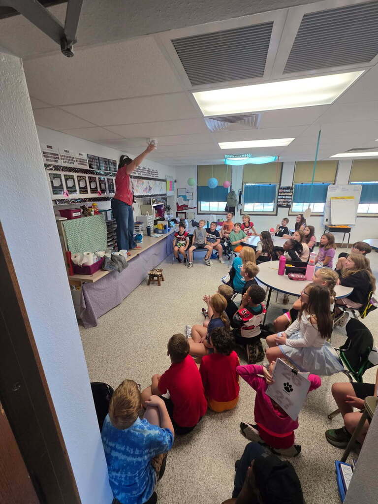 Mrs. Alexander dropping eggs. 