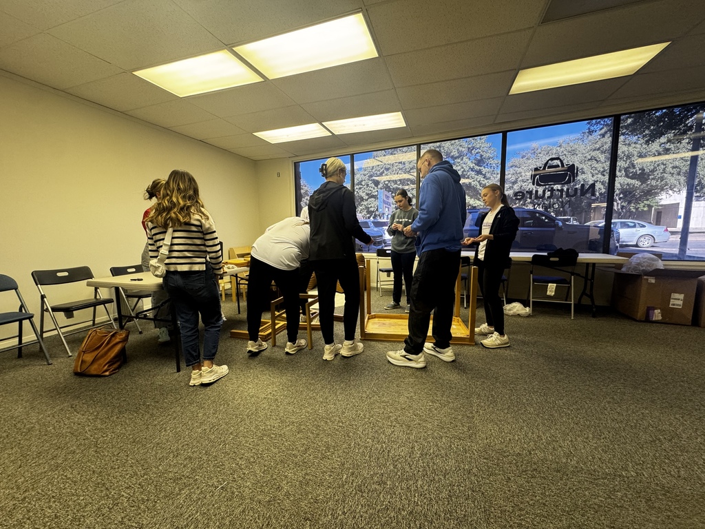 Students building furniture