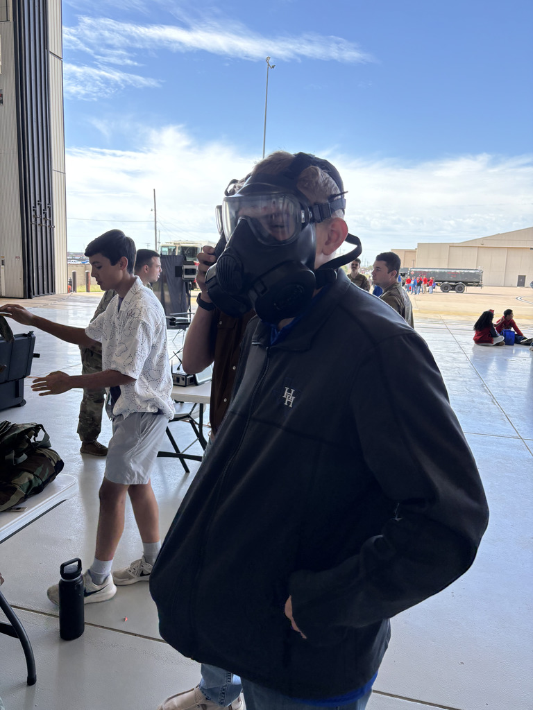 Student wearing oxygen mask