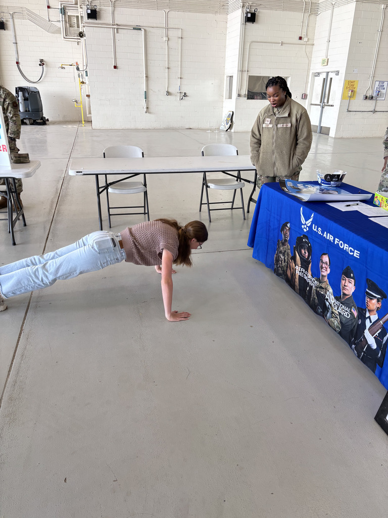 Student doing pushups