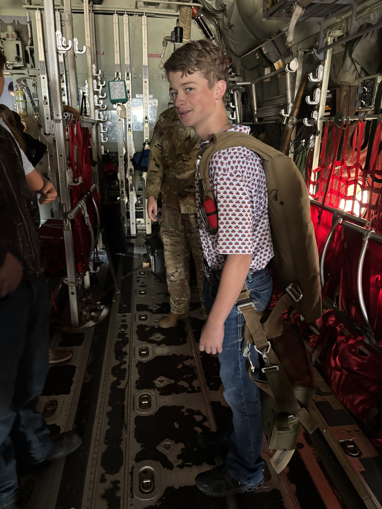 Student wearing parachute