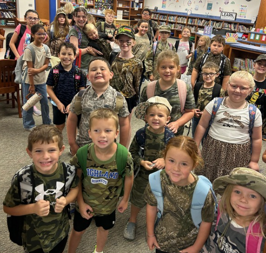 Students dressed in camo