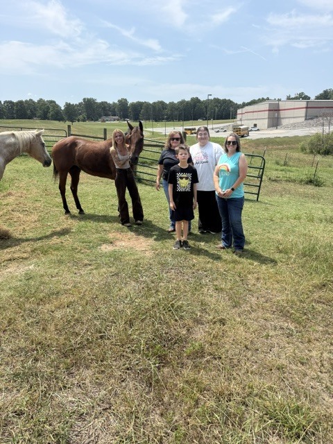 🐴 Meet Willie! We're excited to introduce Willie, the newest addition to the Highland School District's School-Based Mental Health Equine Therapy Program! Willie was generously donated by Miss Katie Clay-Thomas and will work alongside our trained mental health professionals during both individual and group therapy sessions on campus. He has already settled in nicely with the rest of the herd and is looking forward to helping support our students throughout the school year. If you believe your child could benefit from our equine-assisted mental health therapy program, please contact our School-Based Mental Health Director, Mr. Ben Cravens, at ben.cravens@highlandrebels.org for more information. 🐎 A Friendly Reminder: We know it's tempting to stop and visit our therapy animals as they graze in the pasture, but we kindly ask that you do not feed them treats or other food. Rest assured—they are well cared for and receive plenty of feed, treats, and love from our staff! A special thank you to Miss Katie Clay-Thomas for her generous donation and for helping us continue to expand the services and supports available to our students. Welcome to Rebel Nation, Willie! ❤️🩶