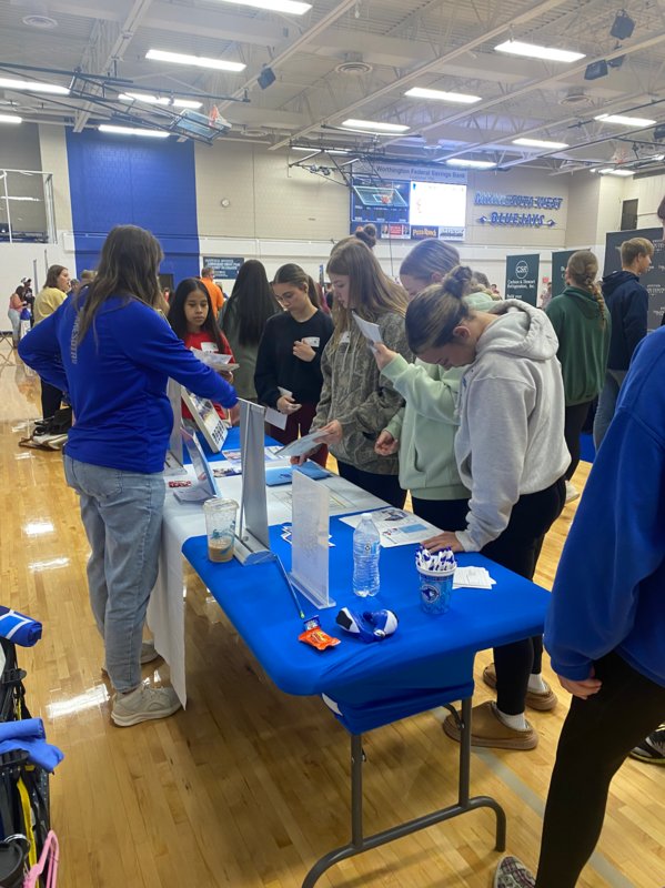 Students checking out one of the booths at the Career Fair