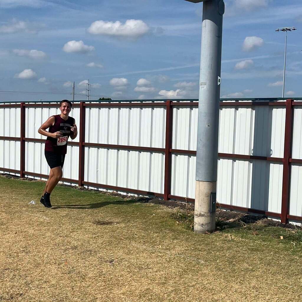 Cross country student-athlete running