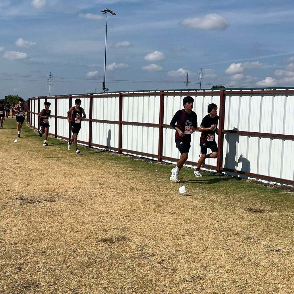 cross country athletes running