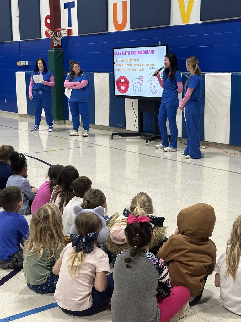 Primary students brush up on their tooth brushing skills. 