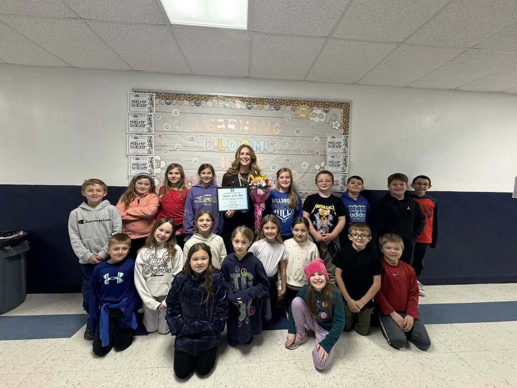 image of Mrs. Ray and students