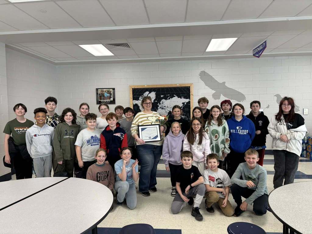 image of Mrs. Bridget Weibel and  her students 