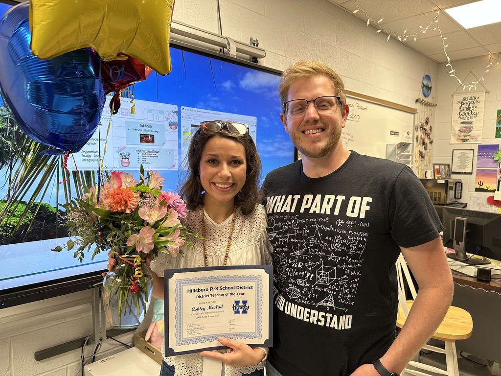 Mrs. Ashley McNail and her husband Mr. RJ McNail moments after Ashley was named District Teacher of the Year!