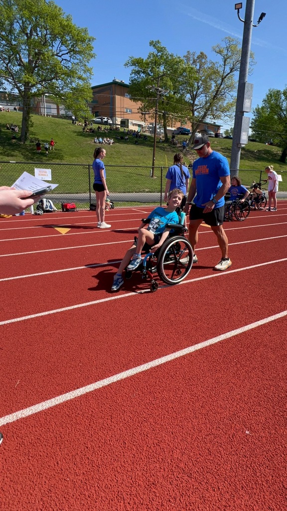 student in a wheelchair during a race at the special olympics in de soto