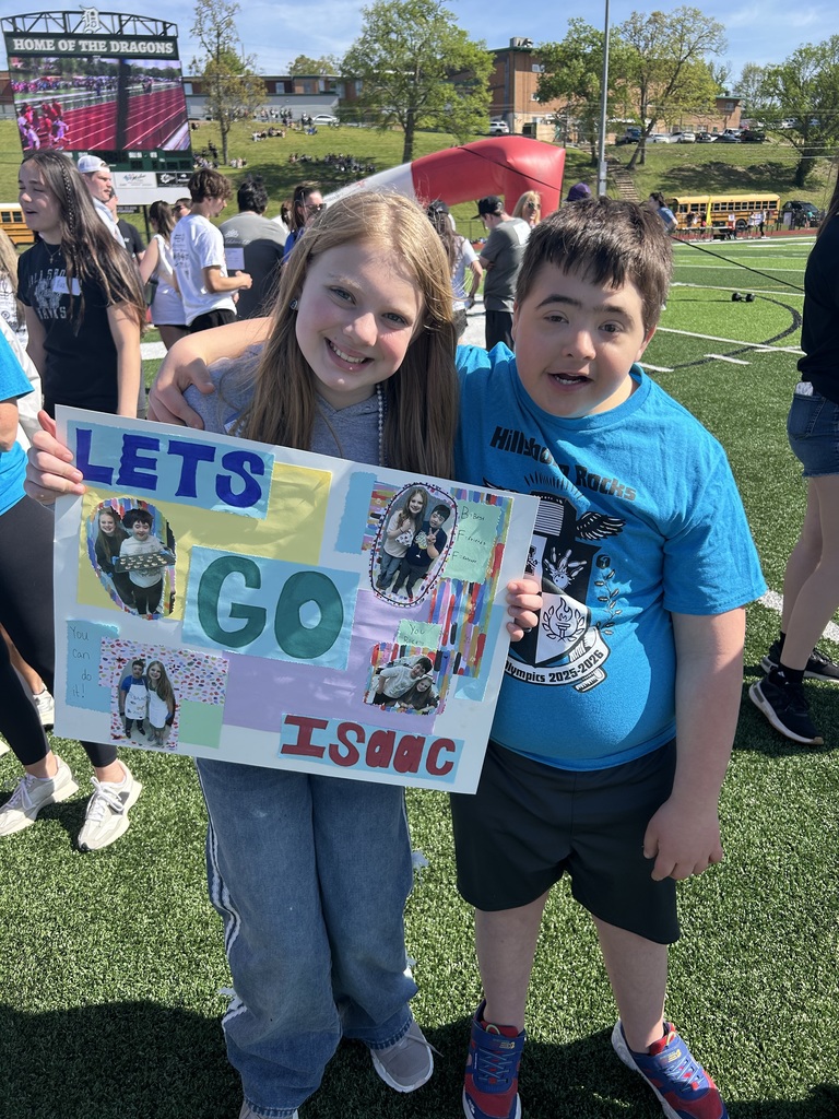 Image shows two students smiling at the camera during the Special Olympics in De Soto