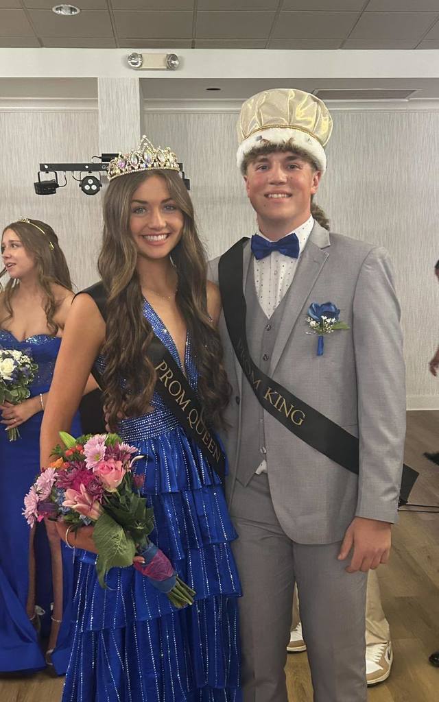 Image is of a prom queen and king. Ashley Hilton and Jackson Marks