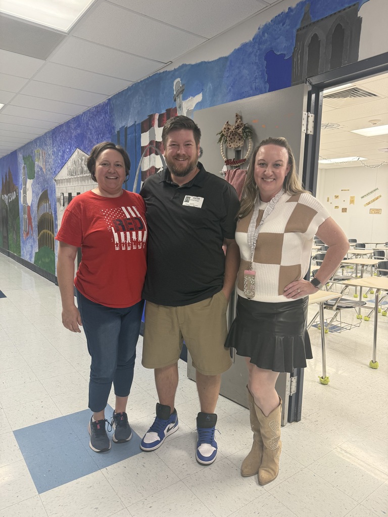 image of mrs. sharon luster, mr. jeff stringer and mrs. mary stephenson after stringer visited their military appreciation classes. 