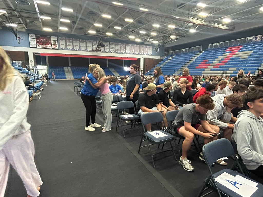 Image of students preparing for graduation night