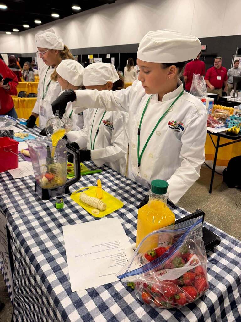 students work on ingredients during jr chefs competition
