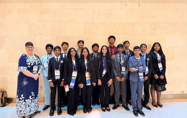 A group of smiling students at a FBLA compatition.