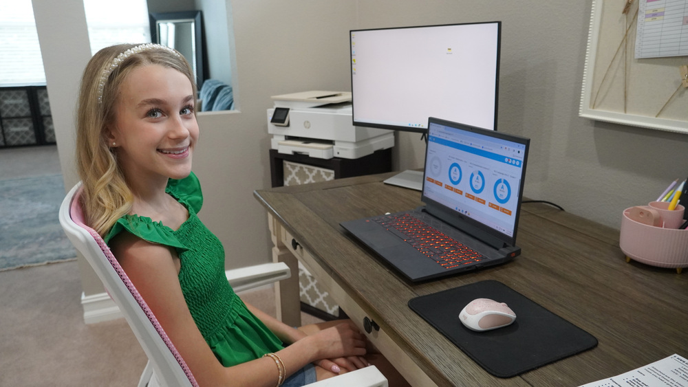 hvs student working on computer at home
