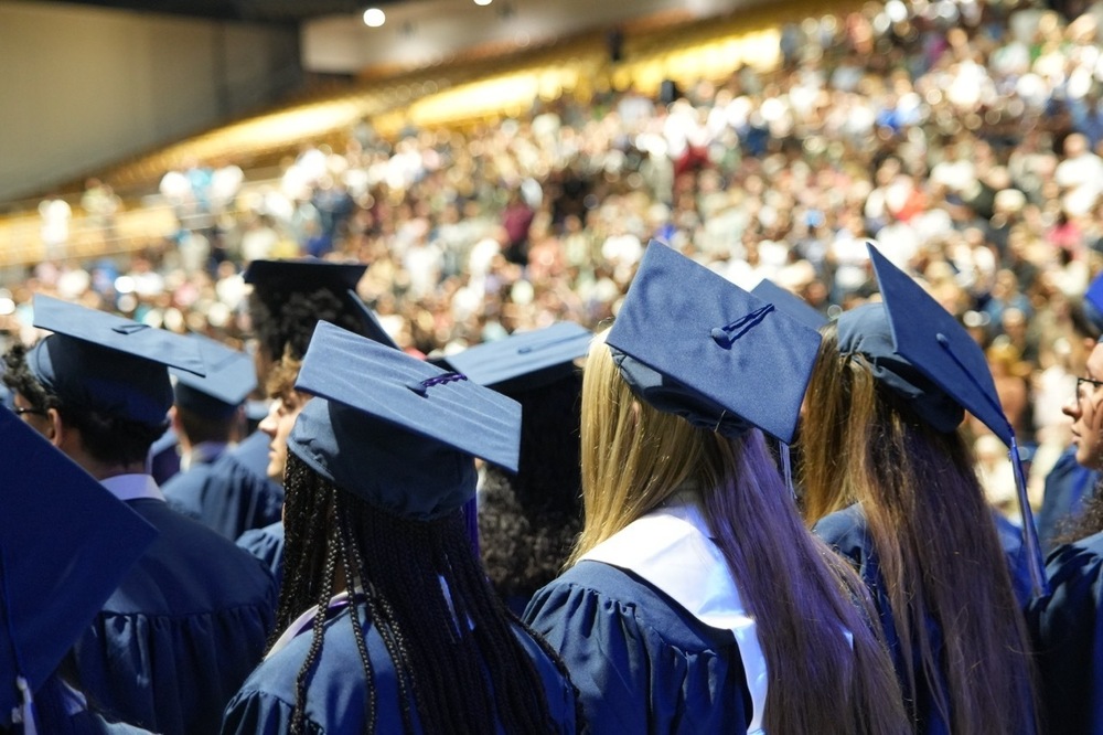 Photo of the back of graduate heads