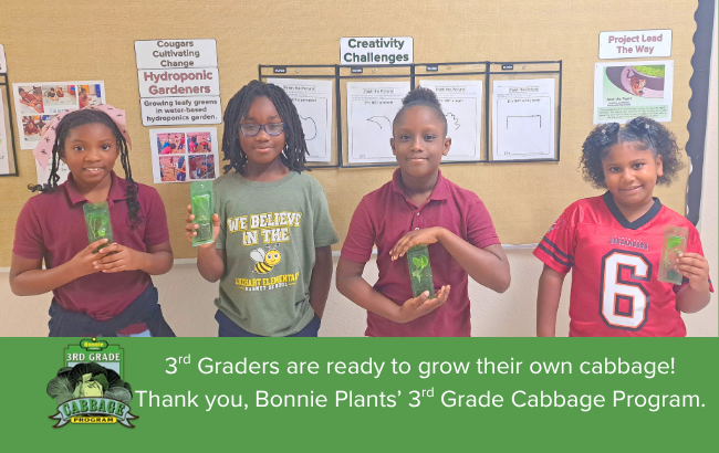 Students Holding Plants
