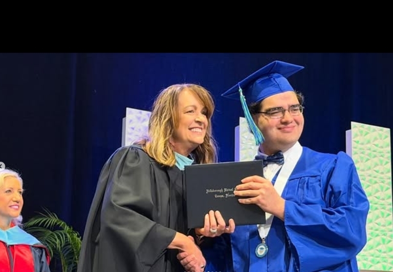 PRINCIPAL AND HVS Graduate with diploma