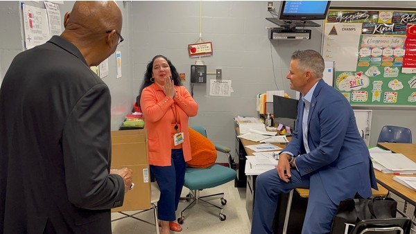 Suley Aquino Teacher and Superintendent Ayres and Board Member "Shake" in classroom