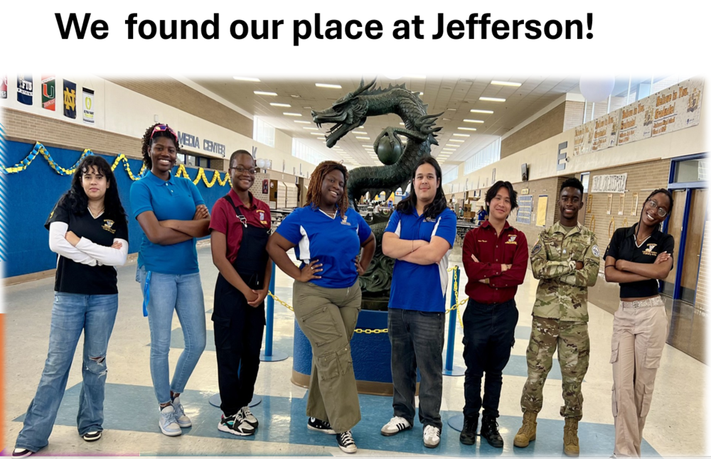 Magnet students in various colored shirts standing in front of Dragon Statue