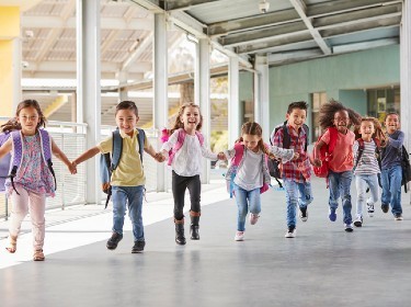 students holding hands