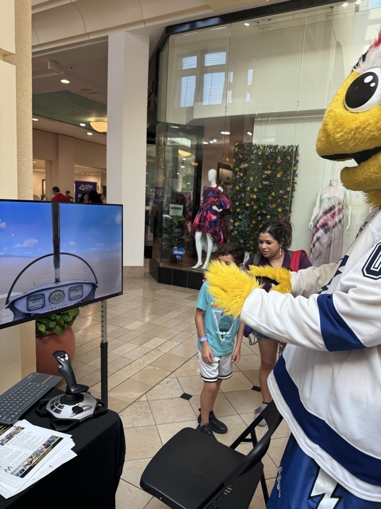 ThunderBig getting ready to fly Stewart Middle Magnet School Flight Sim at Westshore Mall
