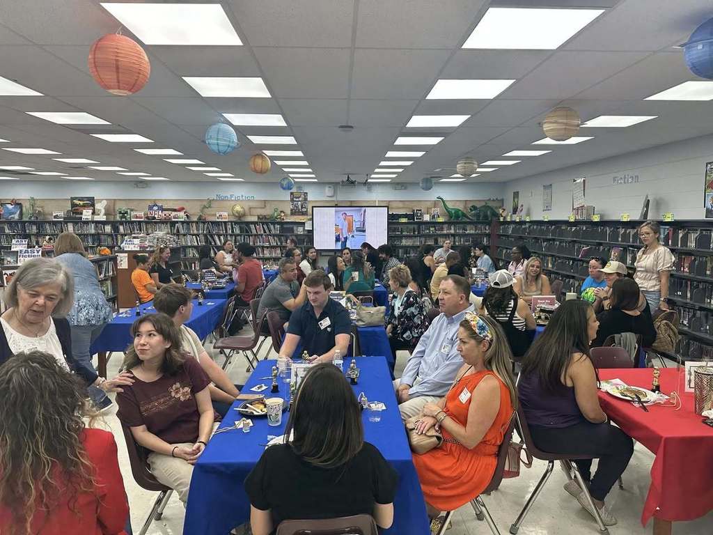 teachers in library