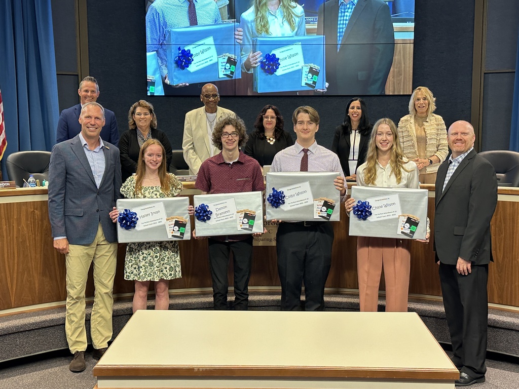 Four students were recognized for having perfect attendance during their K-12 journey