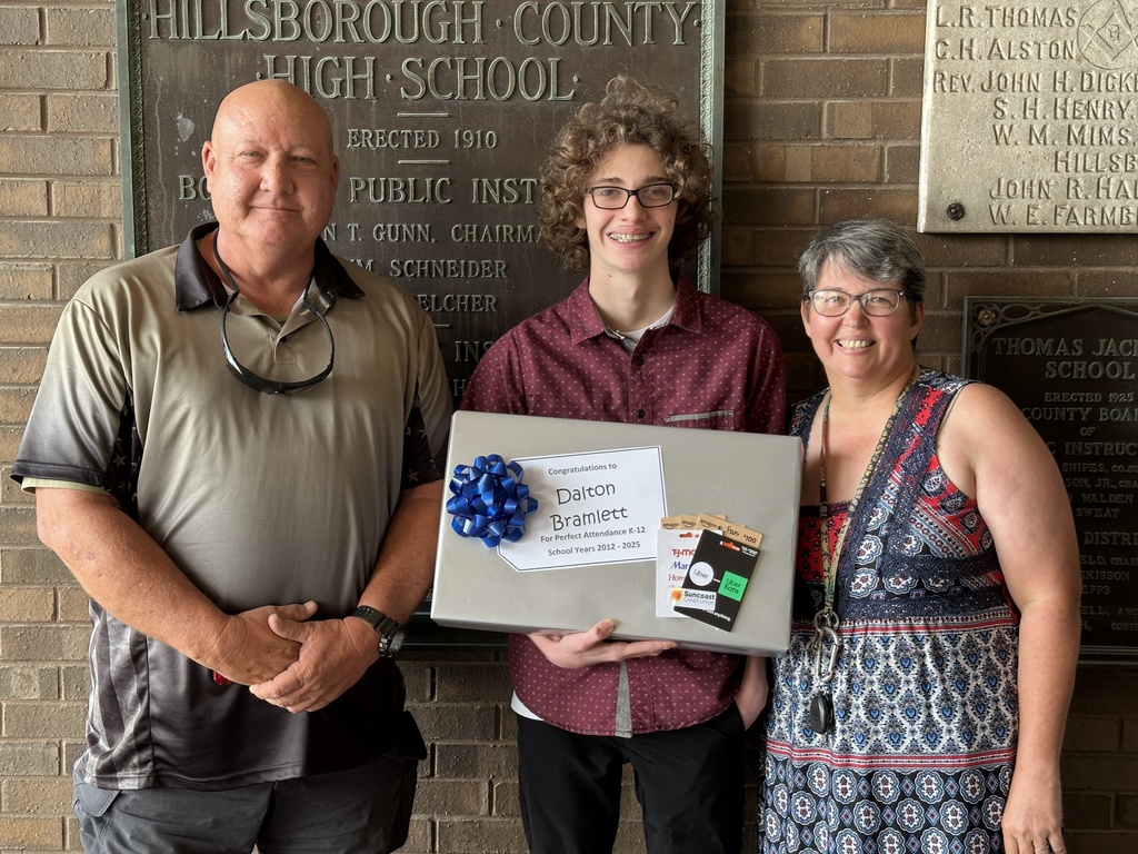 Shown is senior Dalton Bramlett from Durant High School, who received perfect attendance, with his parents