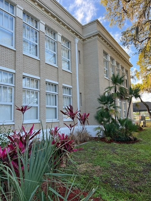 school bldg with flowers