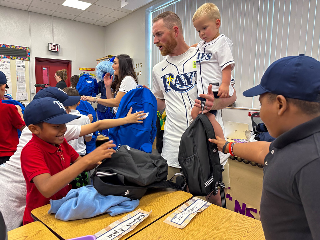 Rays players deliver schools supplies to Tampa Bay Blvd. Elementary