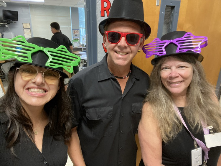 Teachers dress for AVID spirit week twin day. 