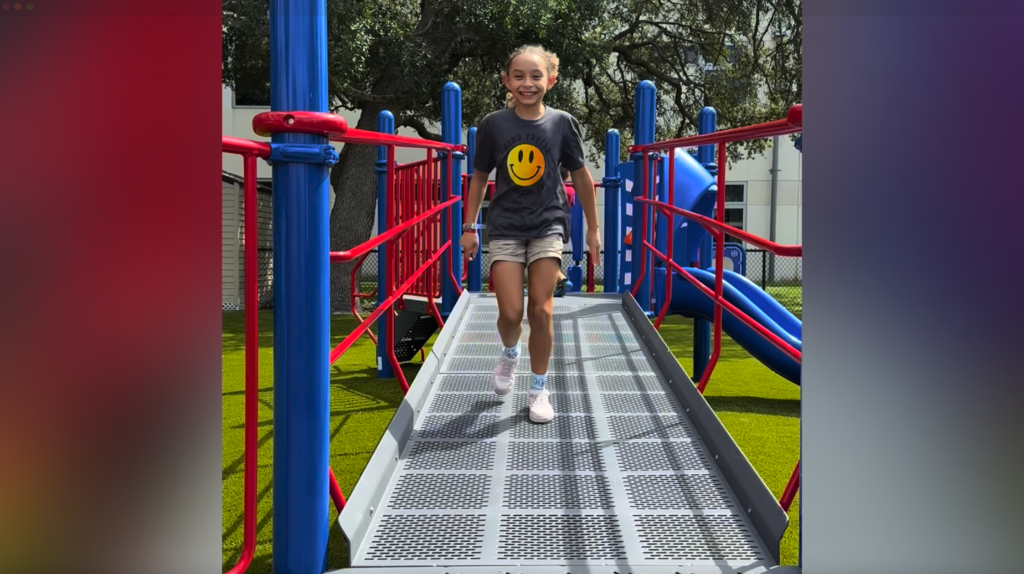 Students on new playground at Citrus Park Elementary School