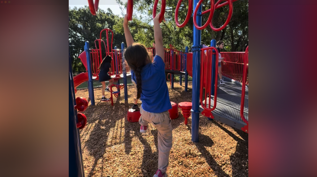 Students on new playground at Citrus Park Elementary School
