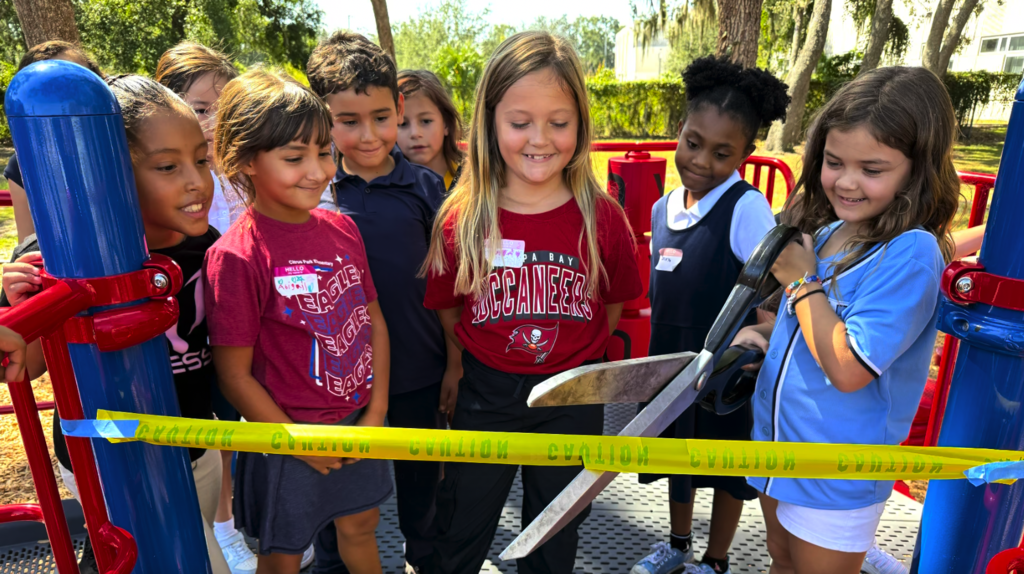 Students on new playground at Citrus Park Elementary School