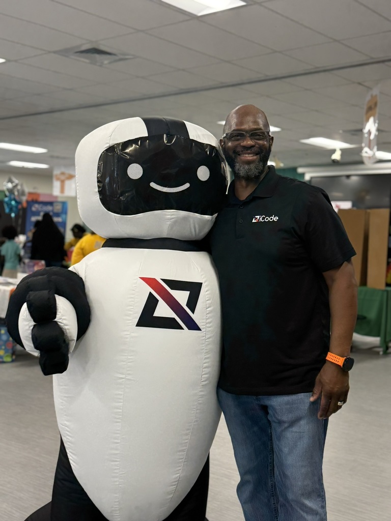 A robot with his handler. -