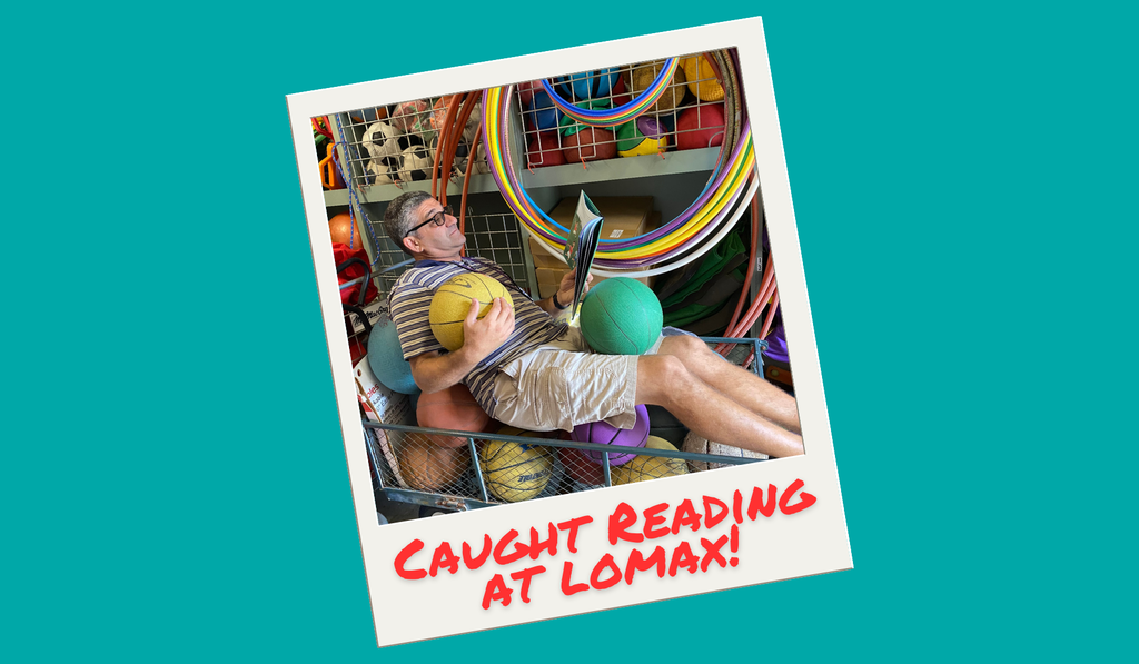 Coach was Caught reading!