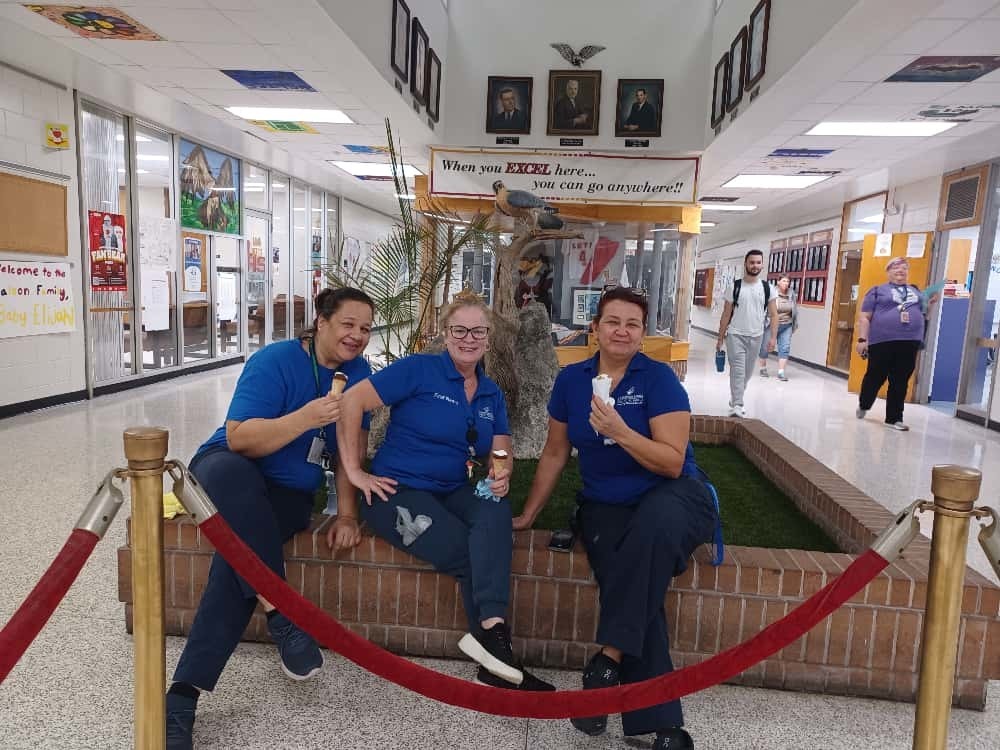 3 members of leto staff enjoying their ice cream