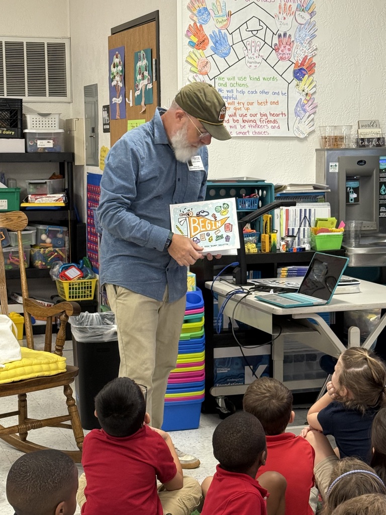 Artist talking to Kindergarten students