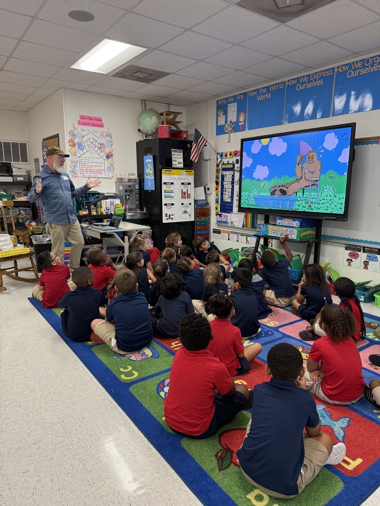 Artist talking to Kindergarten students