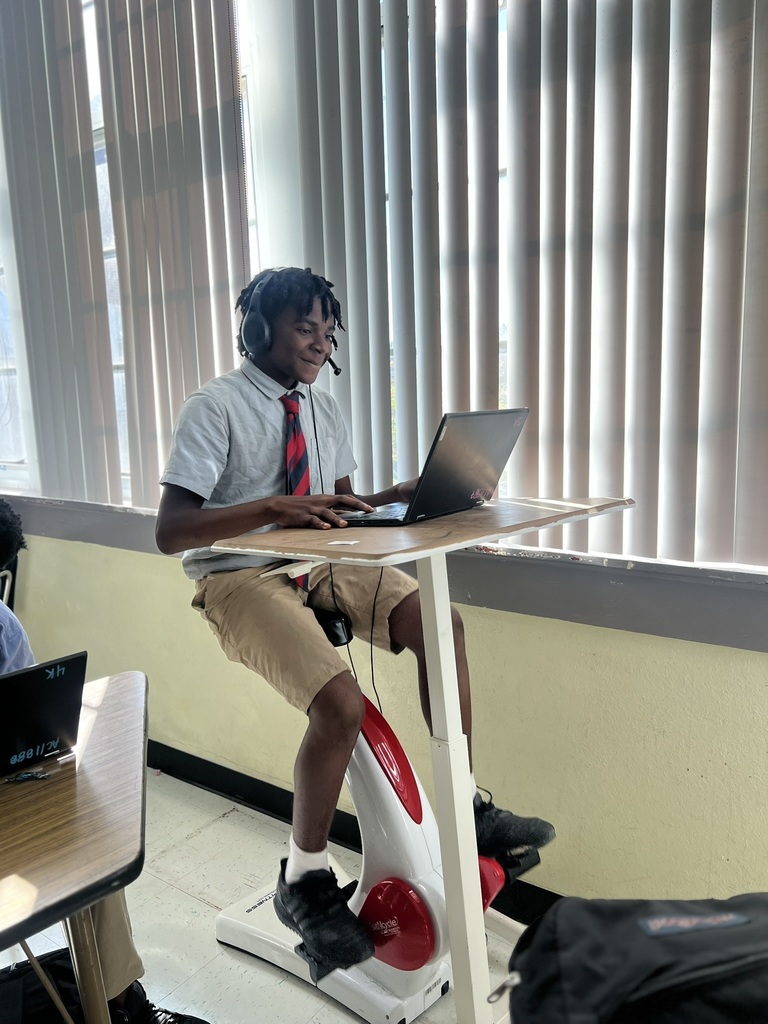 boy doing work and riding a bike