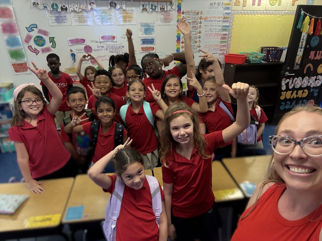 Teacher and students dressed in red