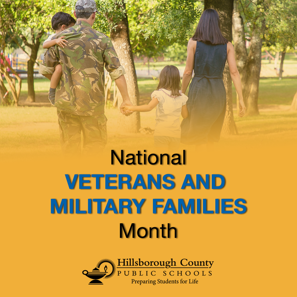 A family walks hand in hand through a sunny park. One adult is wearing a camouflage uniform and carrying a child, while another adult and child walk beside them. The lower part of the image has a golden background with bold blue and black text that reads: “National Veterans and Military Families Month.” Below the text is the Hillsborough County Public Schools logo with the tagline “Preparing Students for Life.”
