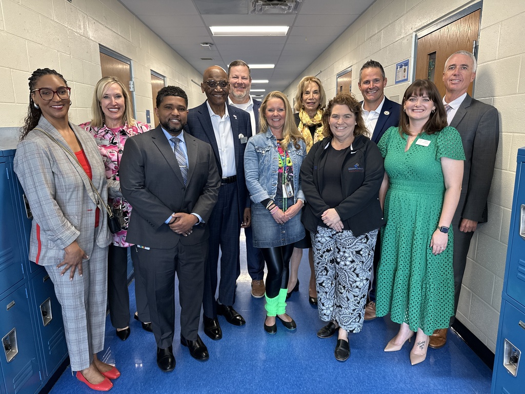 District leadership with Ms. Fisher