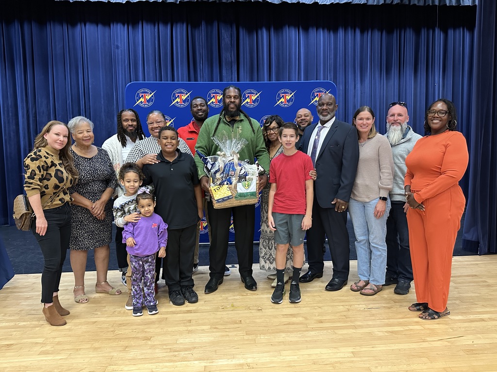 Mr. Mitchell, his friends, and family