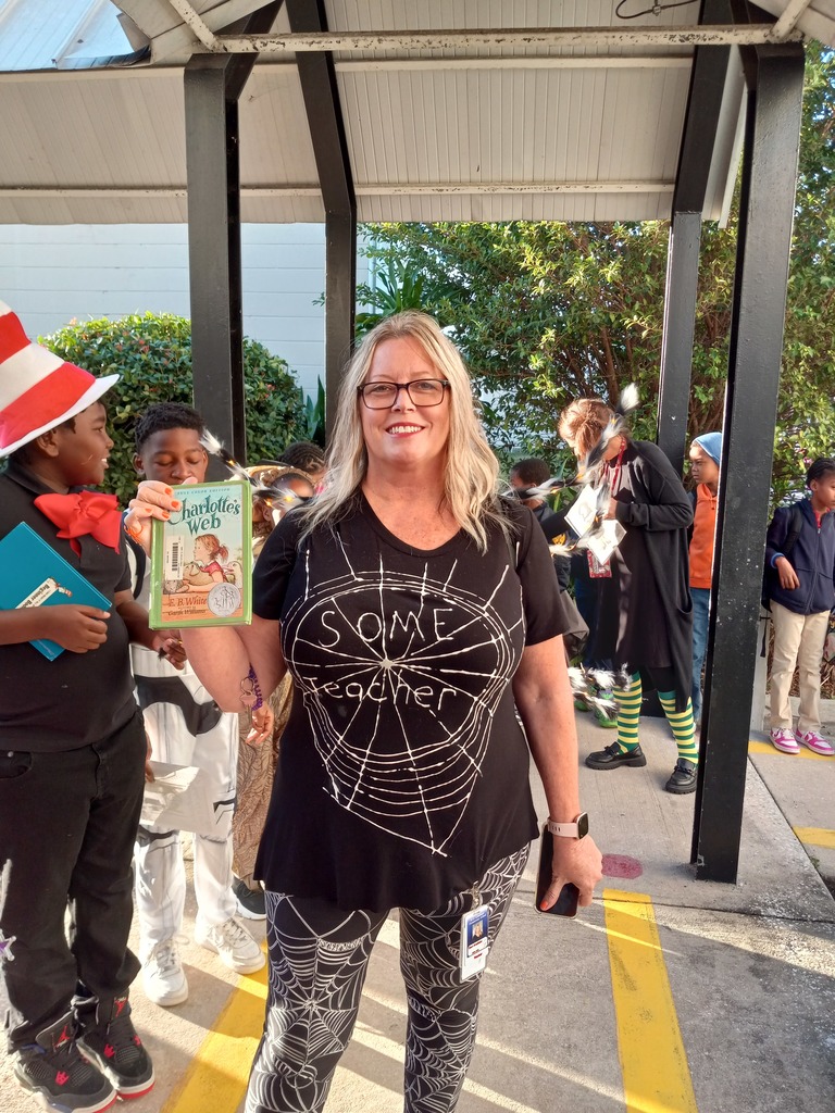Teacher dressed to represent Charlotte's Web.